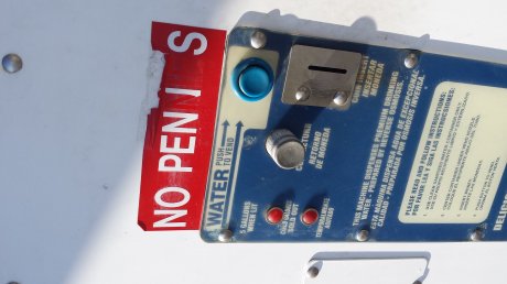 Sign on water/ice dispenser outside 7-11
