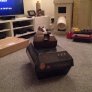 My cat in a cardboard tank, she's not left it for an hour