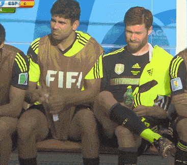 Costa trying to shave Xabi Alonso's leg on the bench.