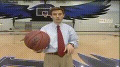 Reporter unknowingly sinks backwards half court shot.
